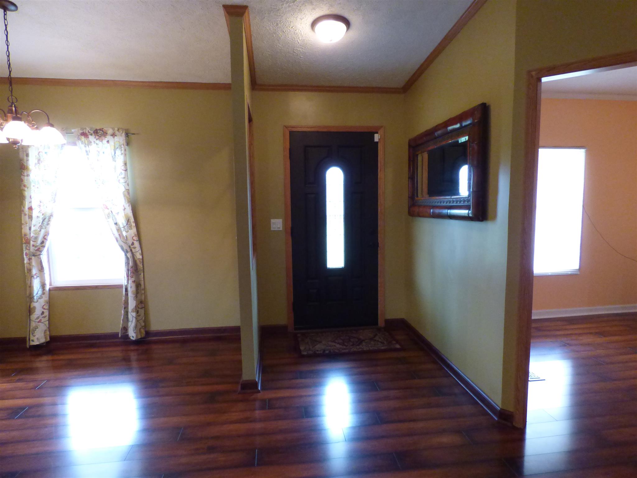 2022 Miller Crossroads Road Hillsboro, TN 37342 - Photo 8 of 24 A wall with a window separates the foyer from the living room.
