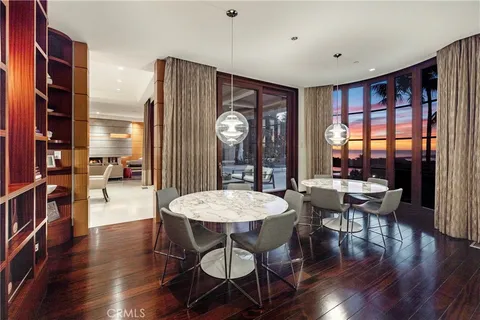 a living room with furniture and large window