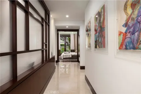 a bedroom with a bed couch and window