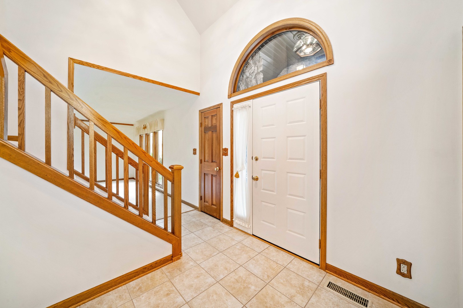 1027 Foxpointe Drive Sycamore, IL 60178 - Photo 25 of 36 a view of staircase with lots of wooden floor