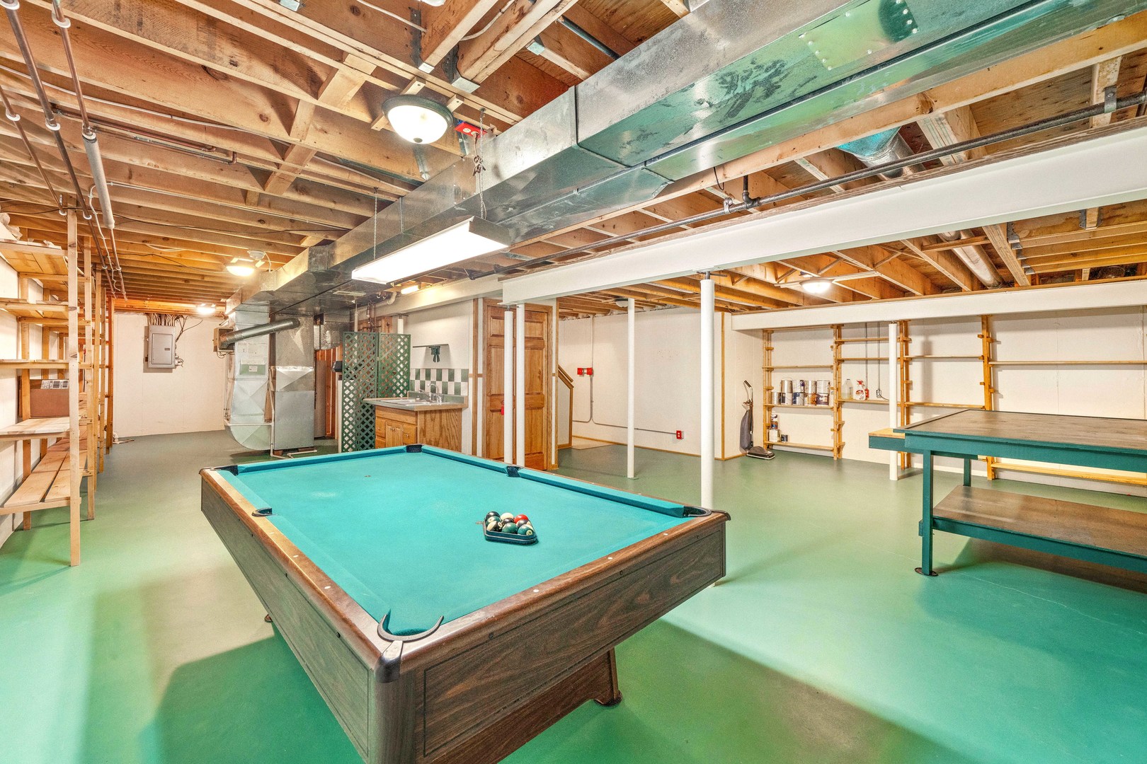 1027 Foxpointe Drive Sycamore, IL 60178 - Photo 36 of 36 a room with pool table and windows