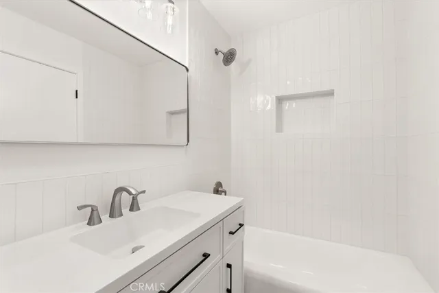 a bathroom with a sink and a bathtub