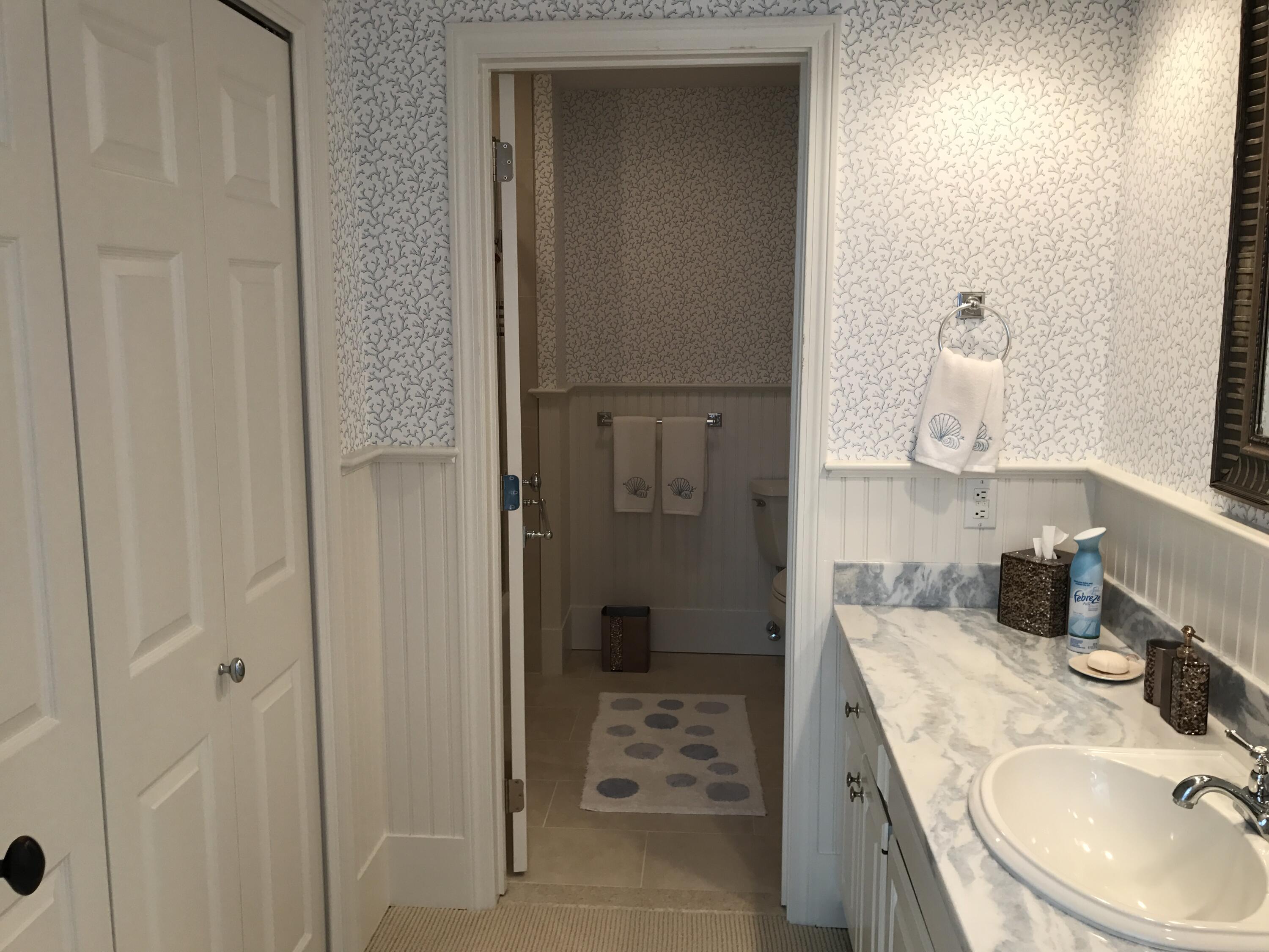 182 Sesuit Neck Road East Dennis, MA 02641 - Photo 17 of 35 a bathroom with a sink a toilet and shower