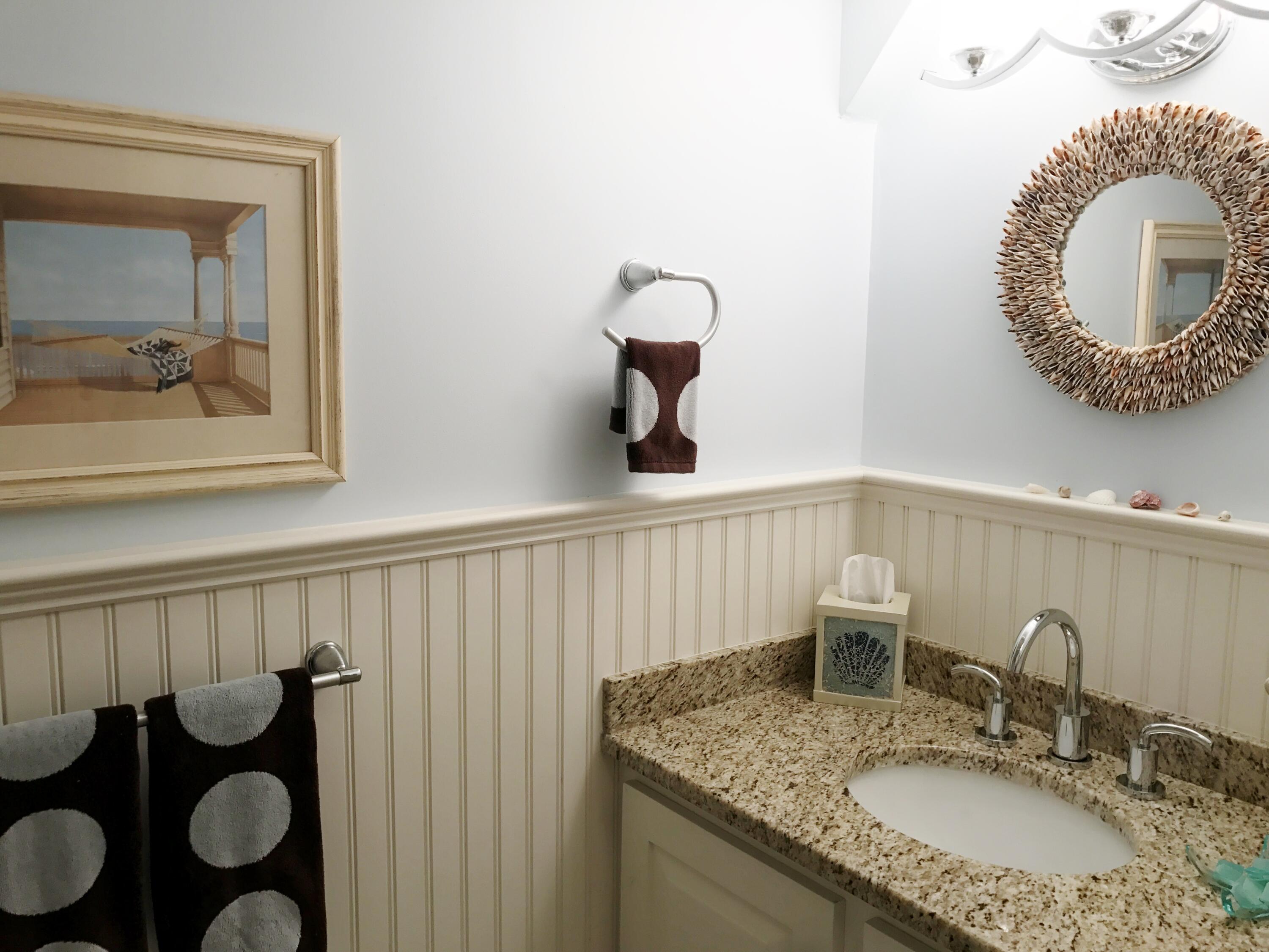 182 Sesuit Neck Road East Dennis, MA 02641 - Photo 22 of 35 a bathroom with a granite countertop sink and a mirror