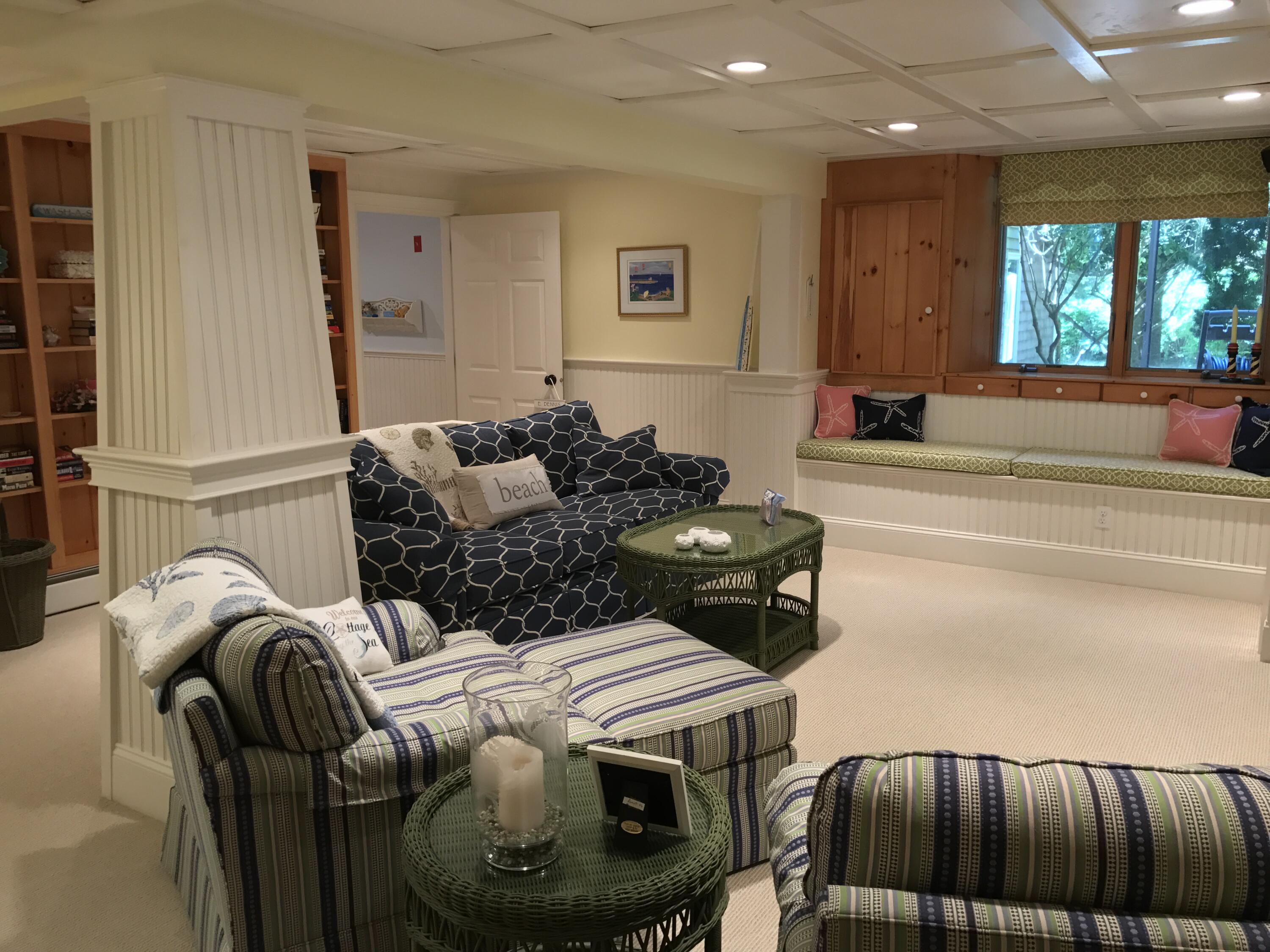 182 Sesuit Neck Road East Dennis, MA 02641 - Photo 23 of 35 a living room with furniture