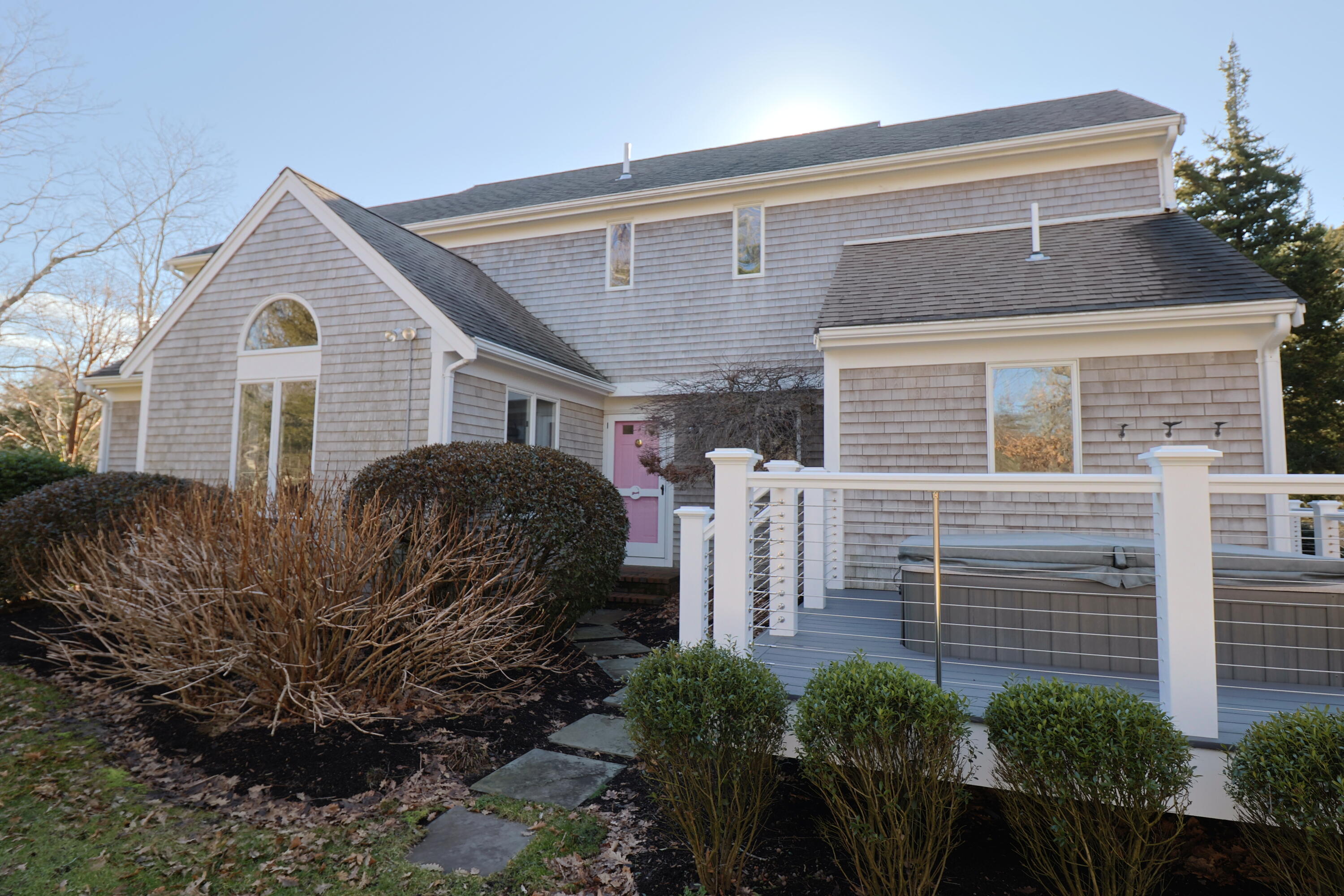 182 Sesuit Neck Road East Dennis, MA 02641 - Photo 4 of 35 a front view of a house with garden