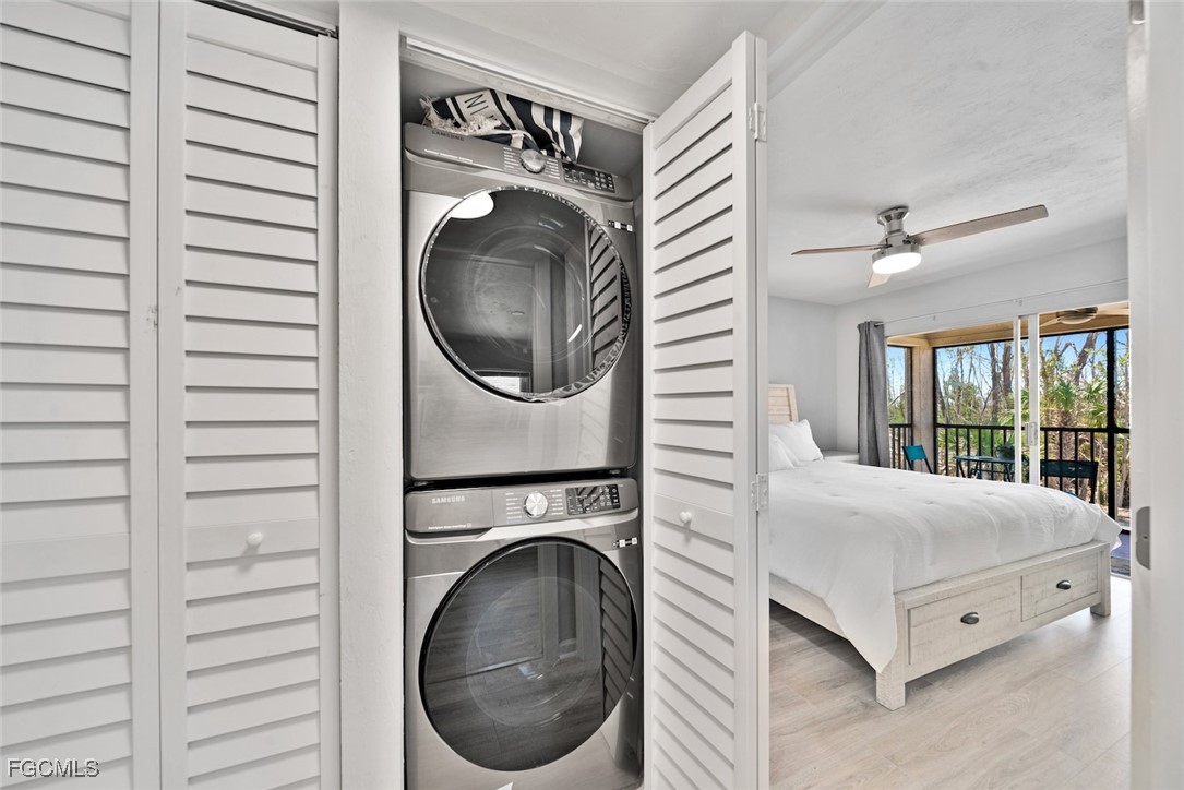 16881 Davis Road, Unit 721 Fort Myers, FL 33908 - Photo 14 of 23 a bedroom with a bed and a window