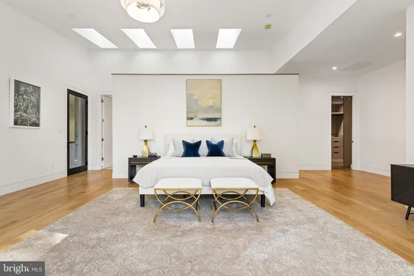 a bed room with a bed and a table