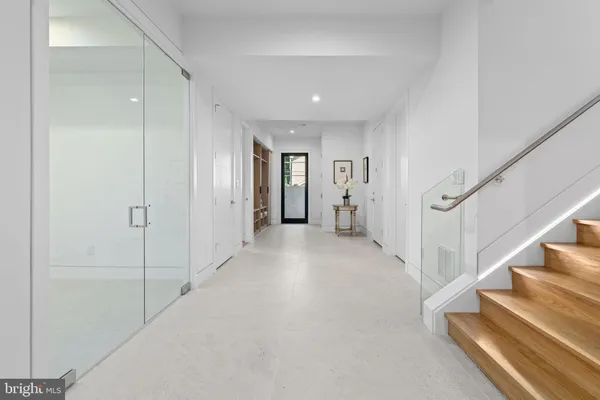 a view of a hallway with staircase