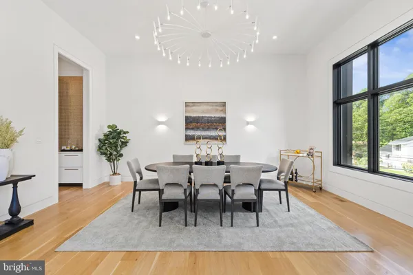 a view of a dining room with furniture window and outside view