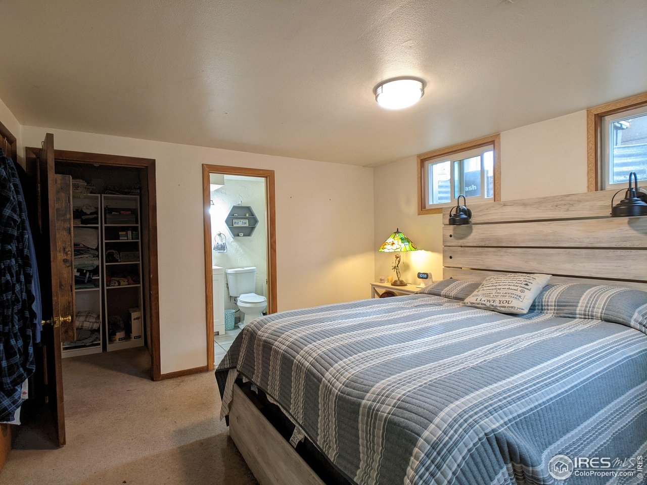 2042 27th Street Greeley, CO 80631 - Photo 22 of 34 Downstairs Bedroom with Attached Bath