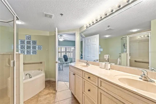 a living room filled with furniture and a floor to ceiling window