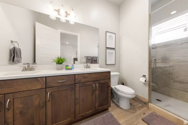 2600 Ocotillo Way, Unit 56 Santa Clara, UT 84765 - Photo 18 of 33 Full bathroom with double vanity and a shower stall