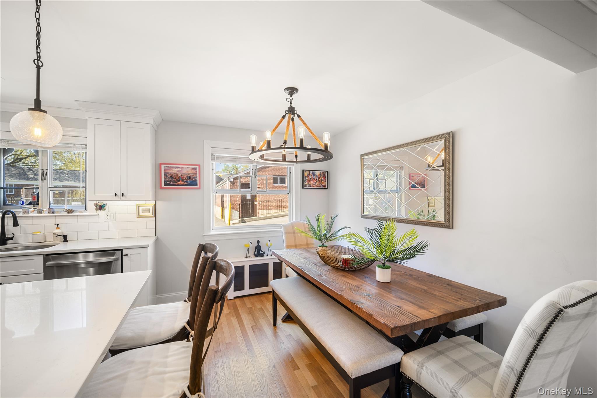 224-09 Manor Road, Unit LOWER) 2408 Queens, NY 11427 - Photo 6 of 20 a view of a dining room with furniture window and wooden floor
