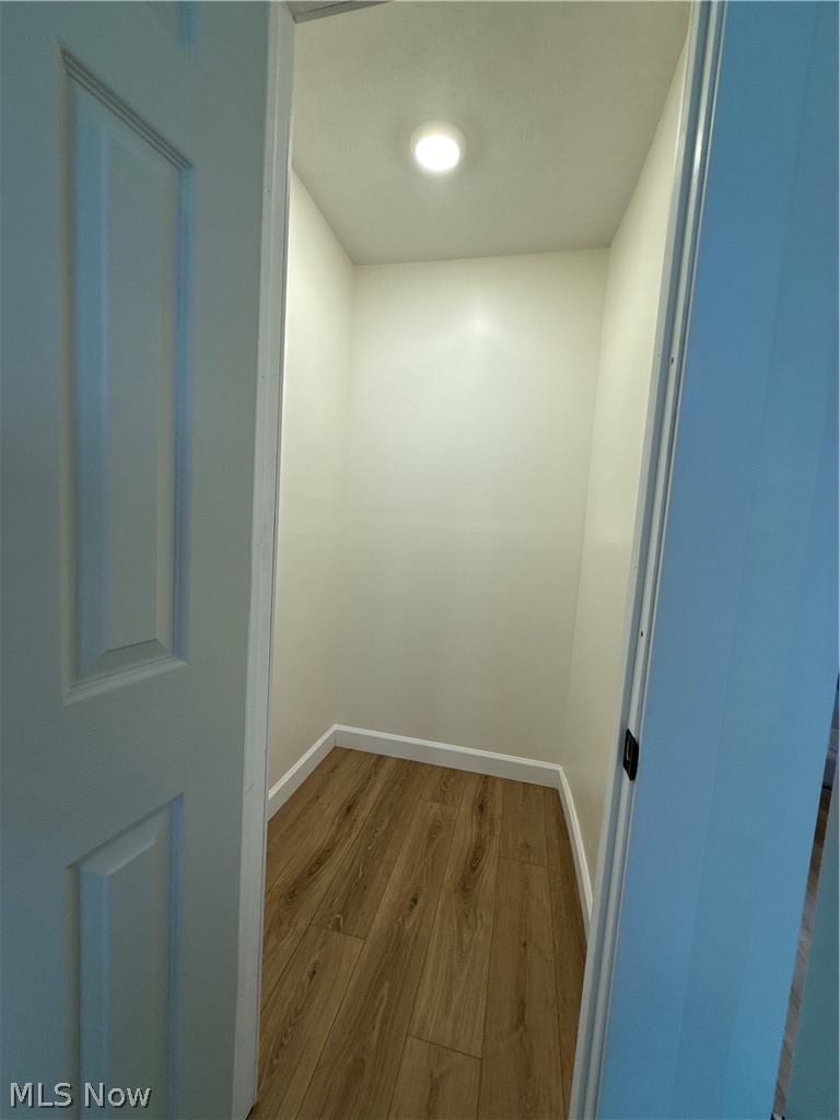 4841 Marigold Road Mentor, OH 44060 - Photo 11 of 12 Recessed lighting illuminates this interior storage space, featuring wood-finish flooring and crisp white baseboards