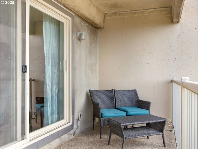 a outdoor living space with furniture and a window