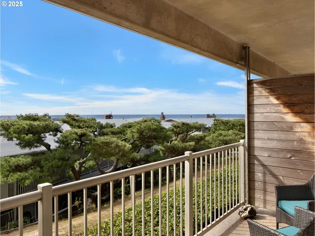 a view of a balcony with city view