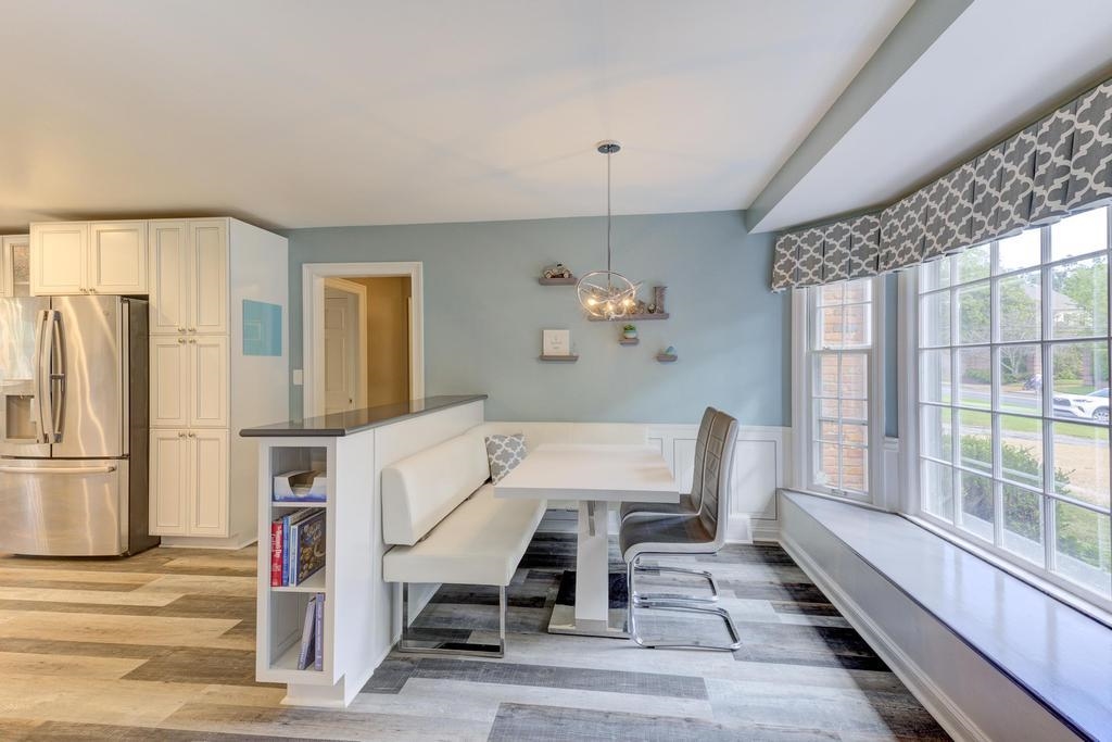 2289 Kirby Road Memphis, TN 38119 - Photo 11 of 35 a view of a dining room with furniture window and wooden floor