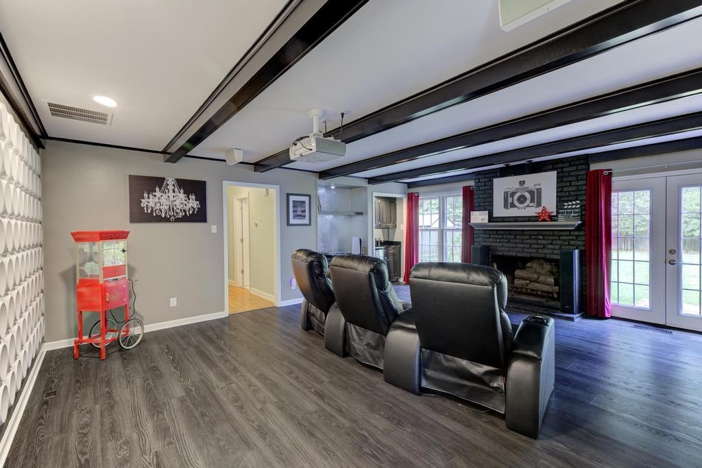 2289 Kirby Road Memphis, TN 38119 - Photo 13 of 35 a living room with furniture and a fireplace