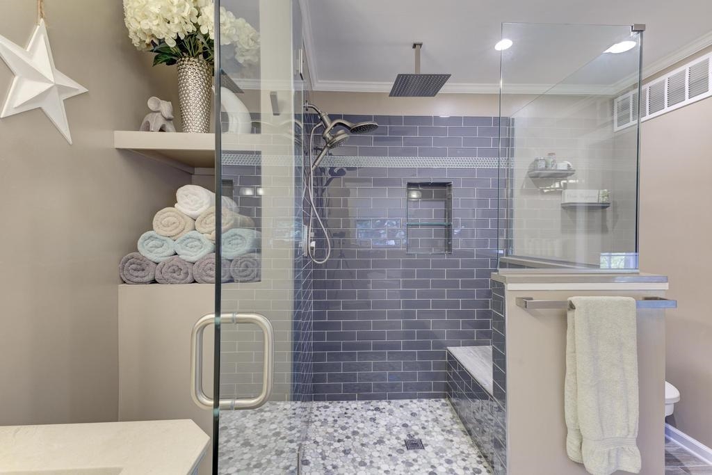 2289 Kirby Road Memphis, TN 38119 - Photo 19 of 35 a bathroom with a toilet sink and shower