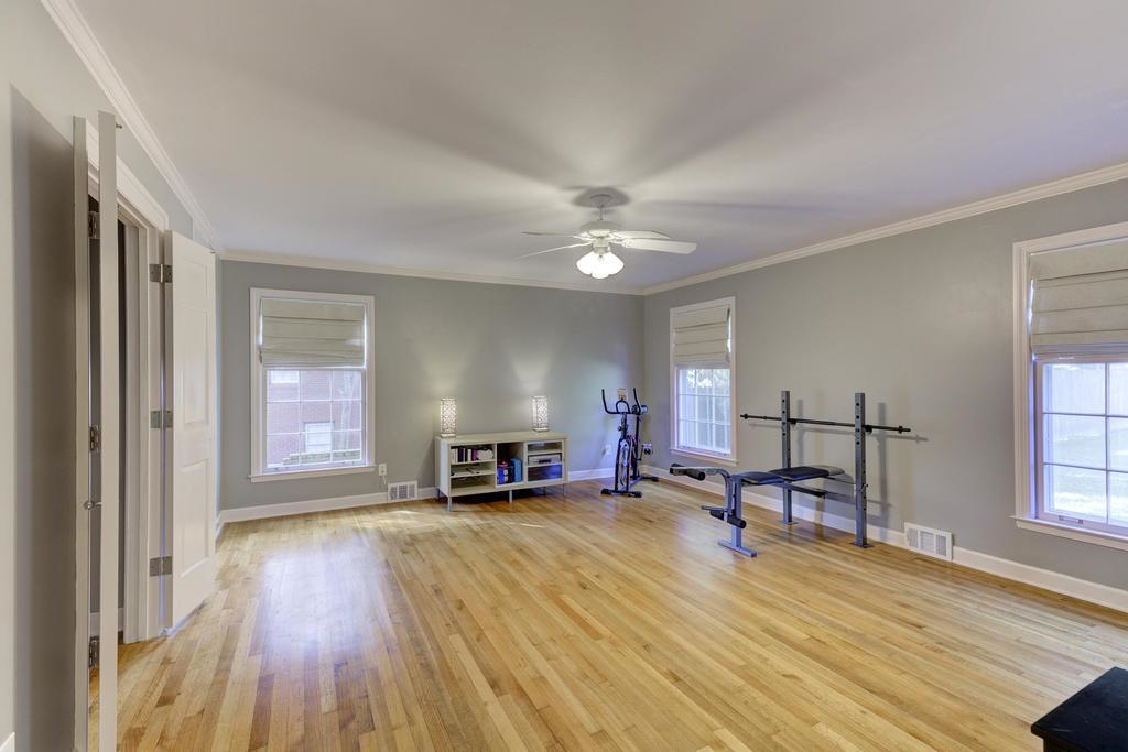 2289 Kirby Road Memphis, TN 38119 - Photo 22 of 35 a living room with furniture and a wooden floor