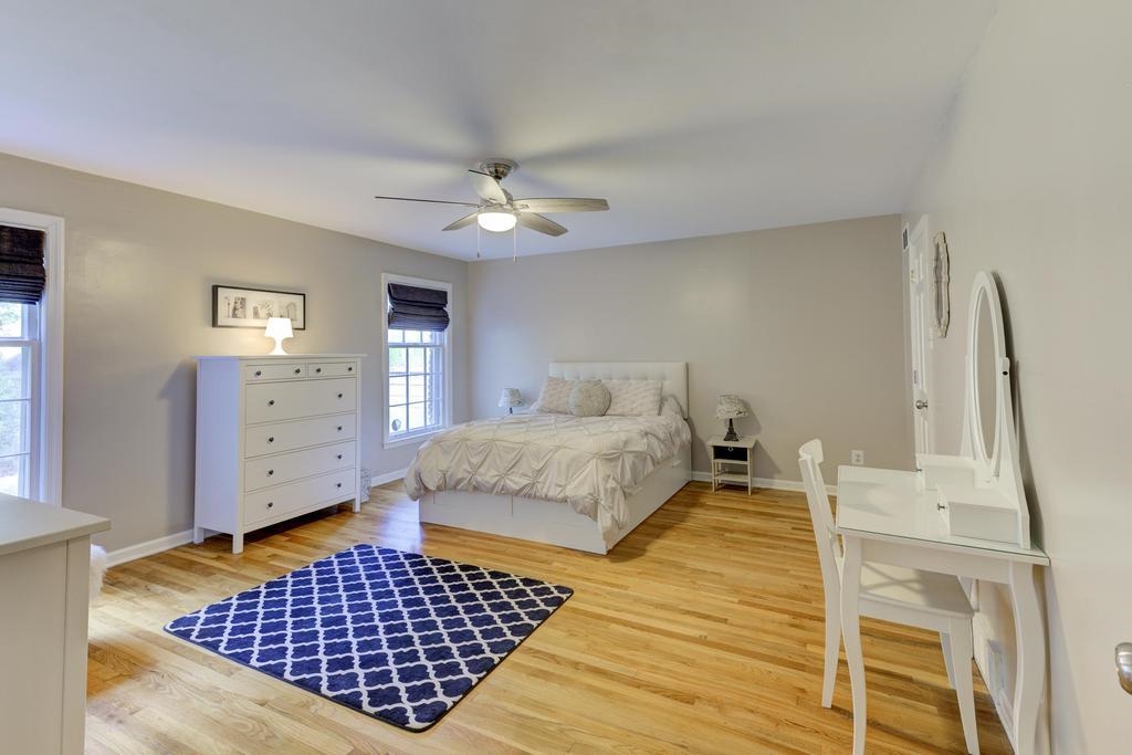 2289 Kirby Road Memphis, TN 38119 - Photo 25 of 35 a bedroom with a bed and a walk in closet