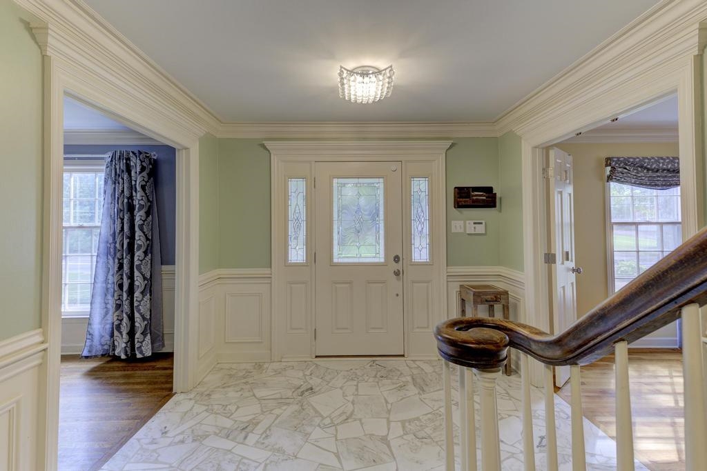 2289 Kirby Road Memphis, TN 38119 - Photo 3 of 35 a view of a livingroom with a furniture and staircase