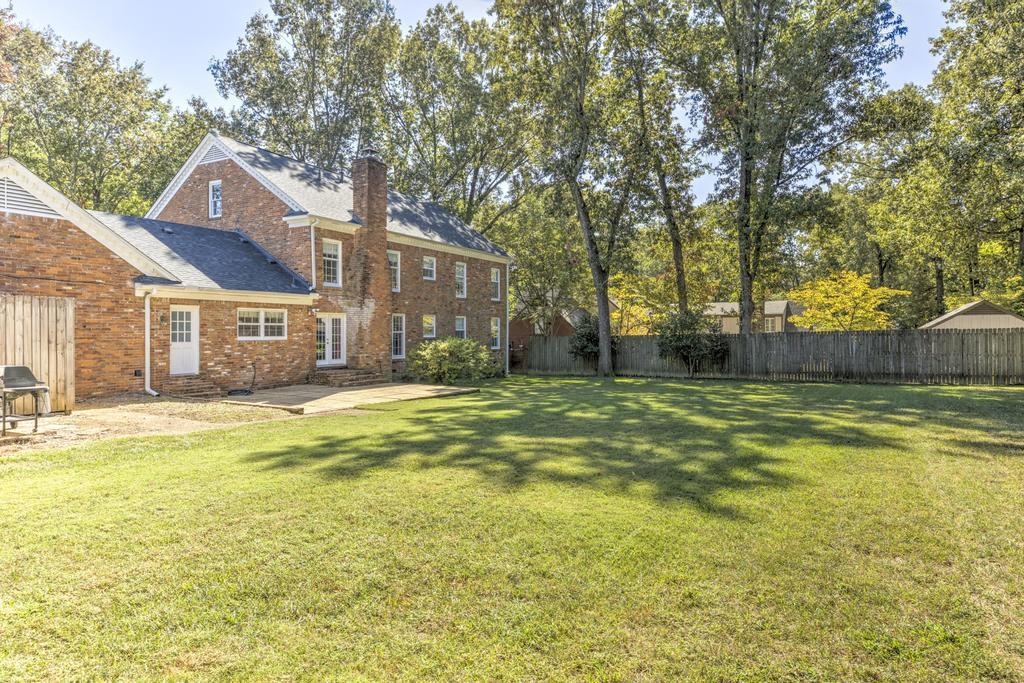 2289 Kirby Road Memphis, TN 38119 - Photo 31 of 35 a view of a house with a swimming pool