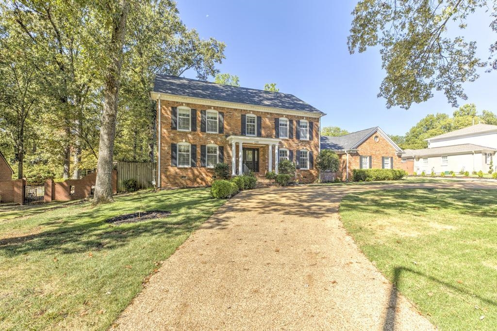 2289 Kirby Road Memphis, TN 38119 - Photo 34 of 35 a view of a house with a swimming pool