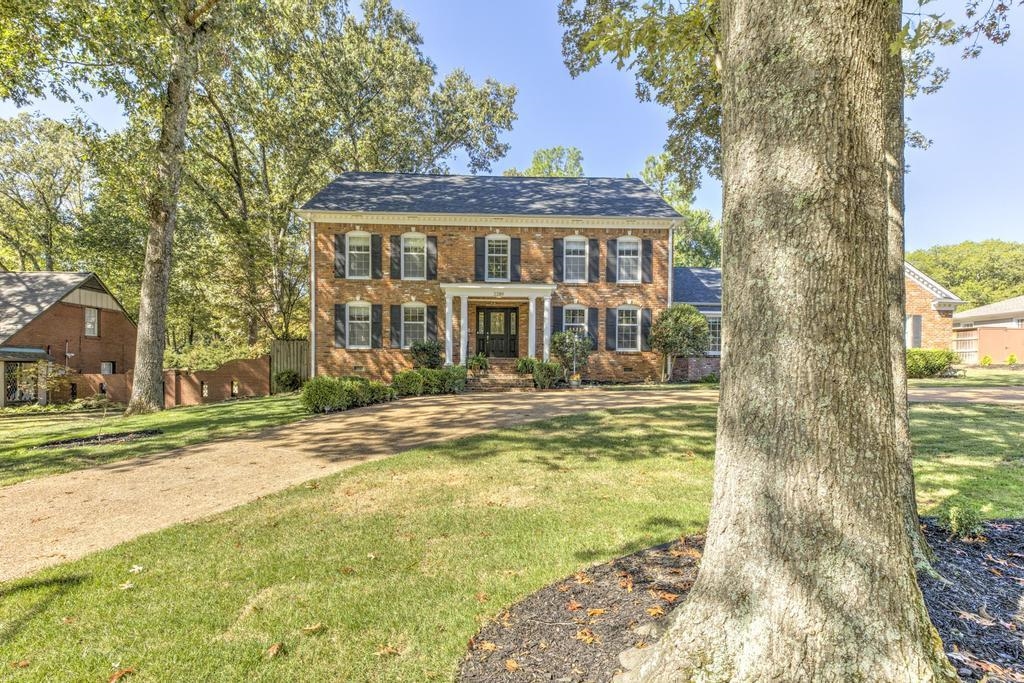 2289 Kirby Road Memphis, TN 38119 - Photo 35 of 35 a front view of a house with a yard
