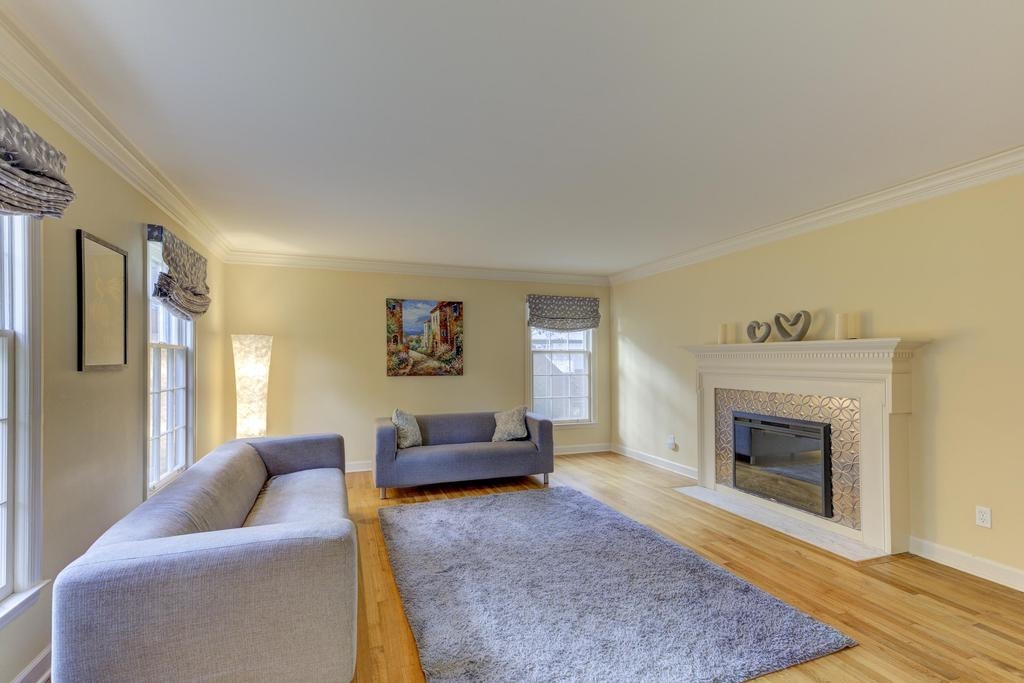 2289 Kirby Road Memphis, TN 38119 - Photo 4 of 35 a living room with furniture and a fireplace