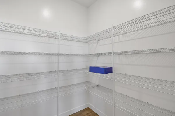 a view of a room with racks on the wall