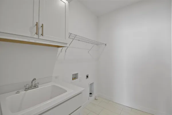 a bathroom with a sink and vanity