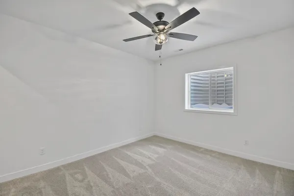 a view of a room with racks on the wall