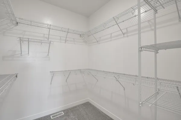 a view of a room with racks on the wall