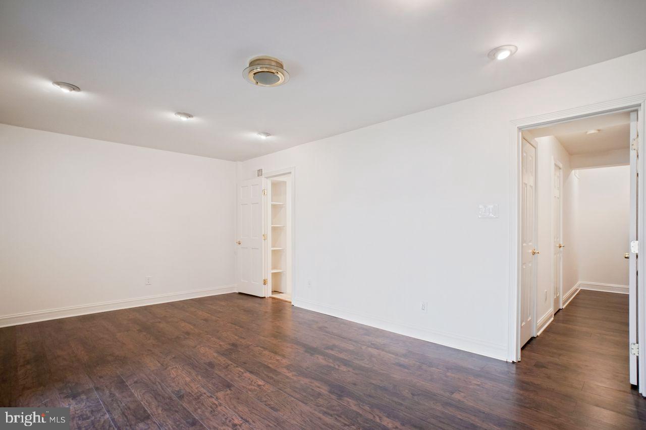5105 Overlook Park Annandale, VA 22003 - Photo 22 of 32 an empty room with wooden floor