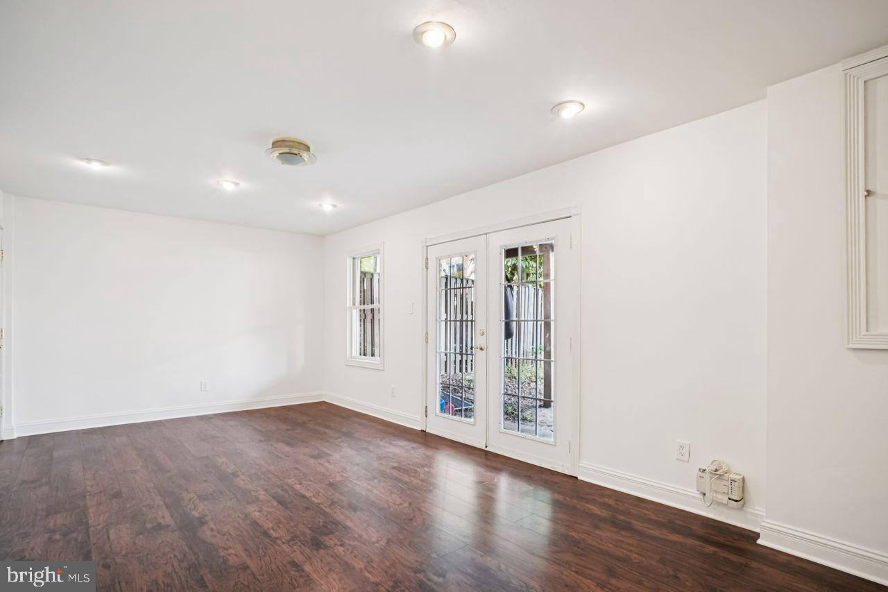 5105 Overlook Park Annandale, VA 22003 - Photo 23 of 32 an empty room with wooden floor and windows