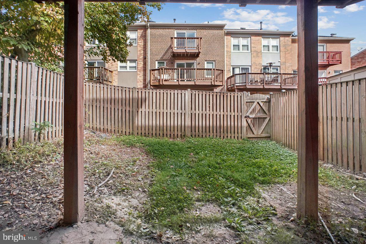5105 Overlook Park Annandale, VA 22003 - Photo 27 of 32 a view of a porch with a floor to ceiling window next to a yard