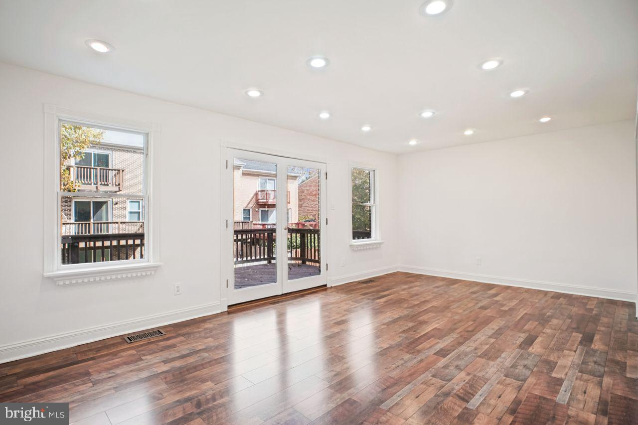 5105 Overlook Park Annandale, VA 22003 - Photo 5 of 32 an empty room with wooden floor and windows