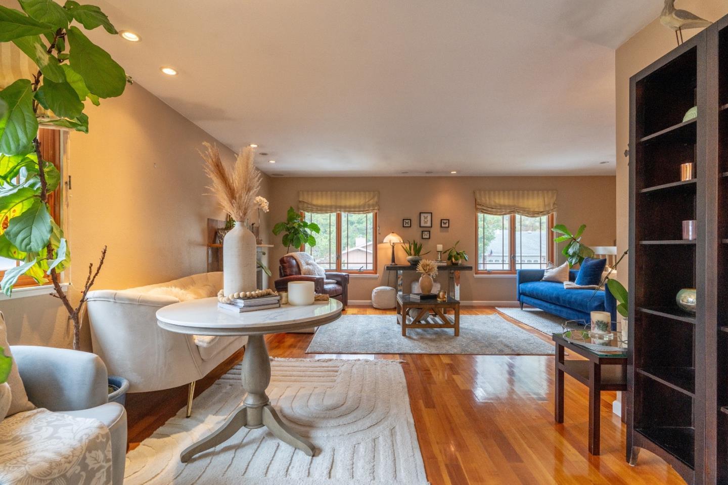 815 Cape Breton Drive Pacifica, CA 94044 - Photo 12 of 65 a view of a dining room with furniture and a potted plant