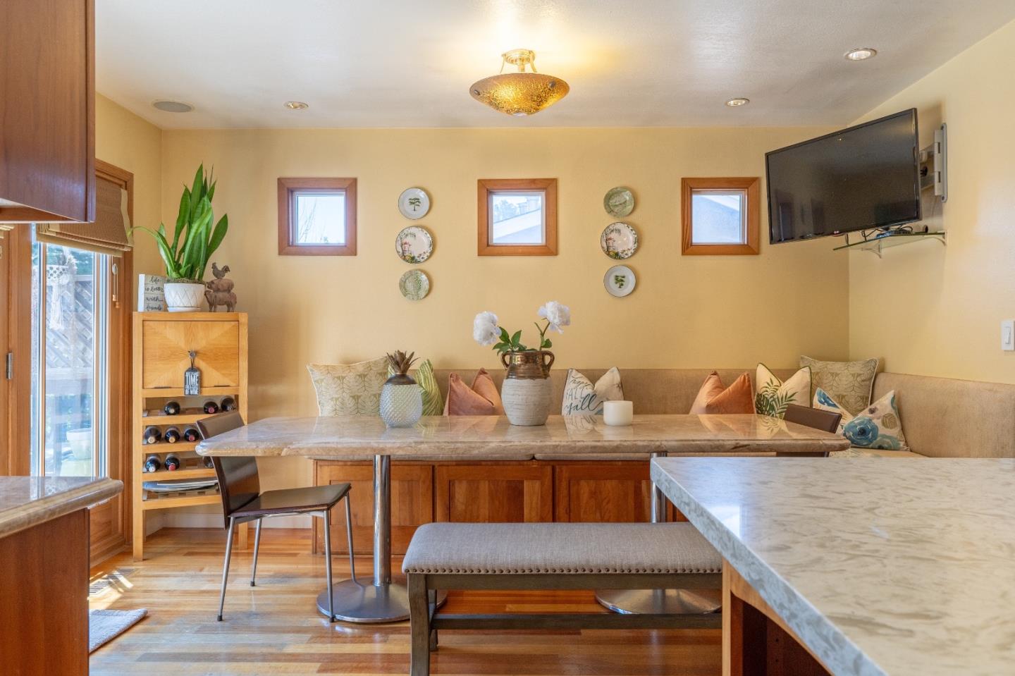815 Cape Breton Drive Pacifica, CA 94044 - Photo 19 of 65 a view of a dining room with furniture