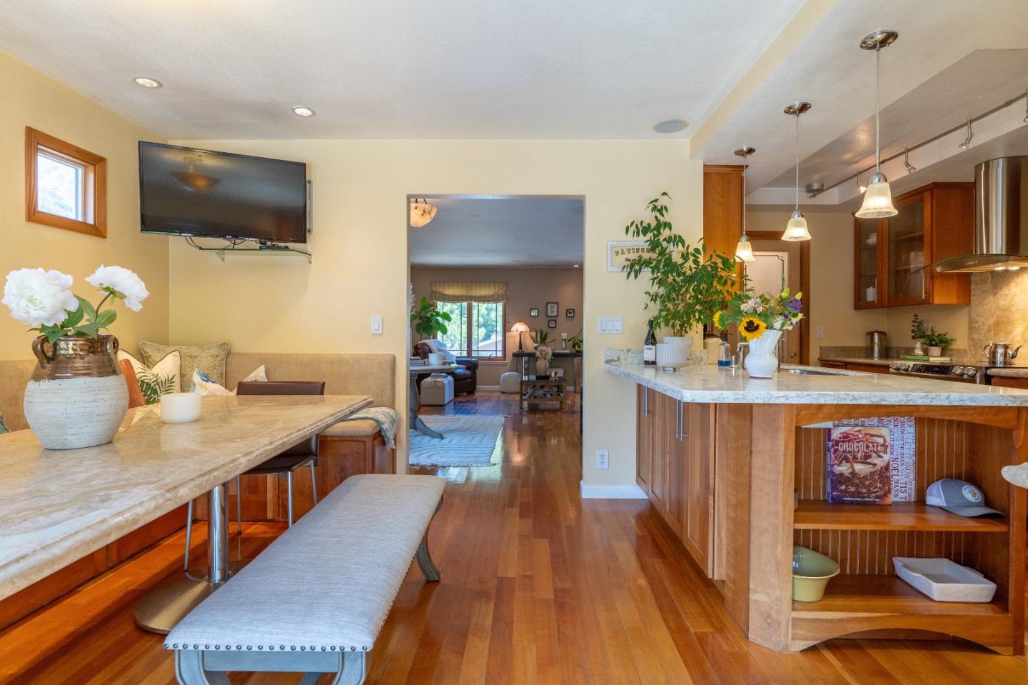815 Cape Breton Drive Pacifica, CA 94044 - Photo 21 of 65 a dining hall with stainless steel appliances granite countertop a stove and a wooden floors