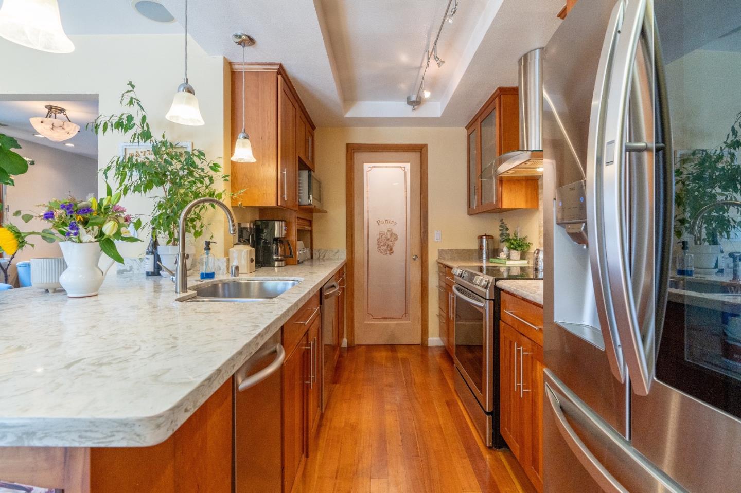 815 Cape Breton Drive Pacifica, CA 94044 - Photo 25 of 65 a kitchen with sink and refrigerator