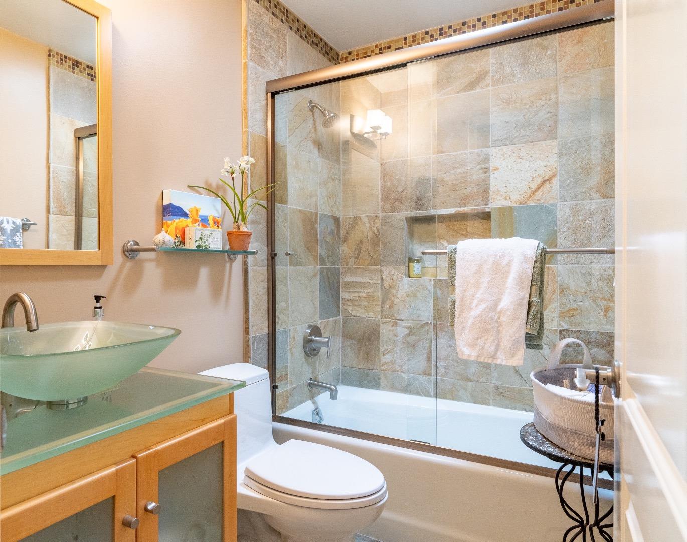 815 Cape Breton Drive Pacifica, CA 94044 - Photo 33 of 65 a bathroom with a sink a toilet and a bathtub