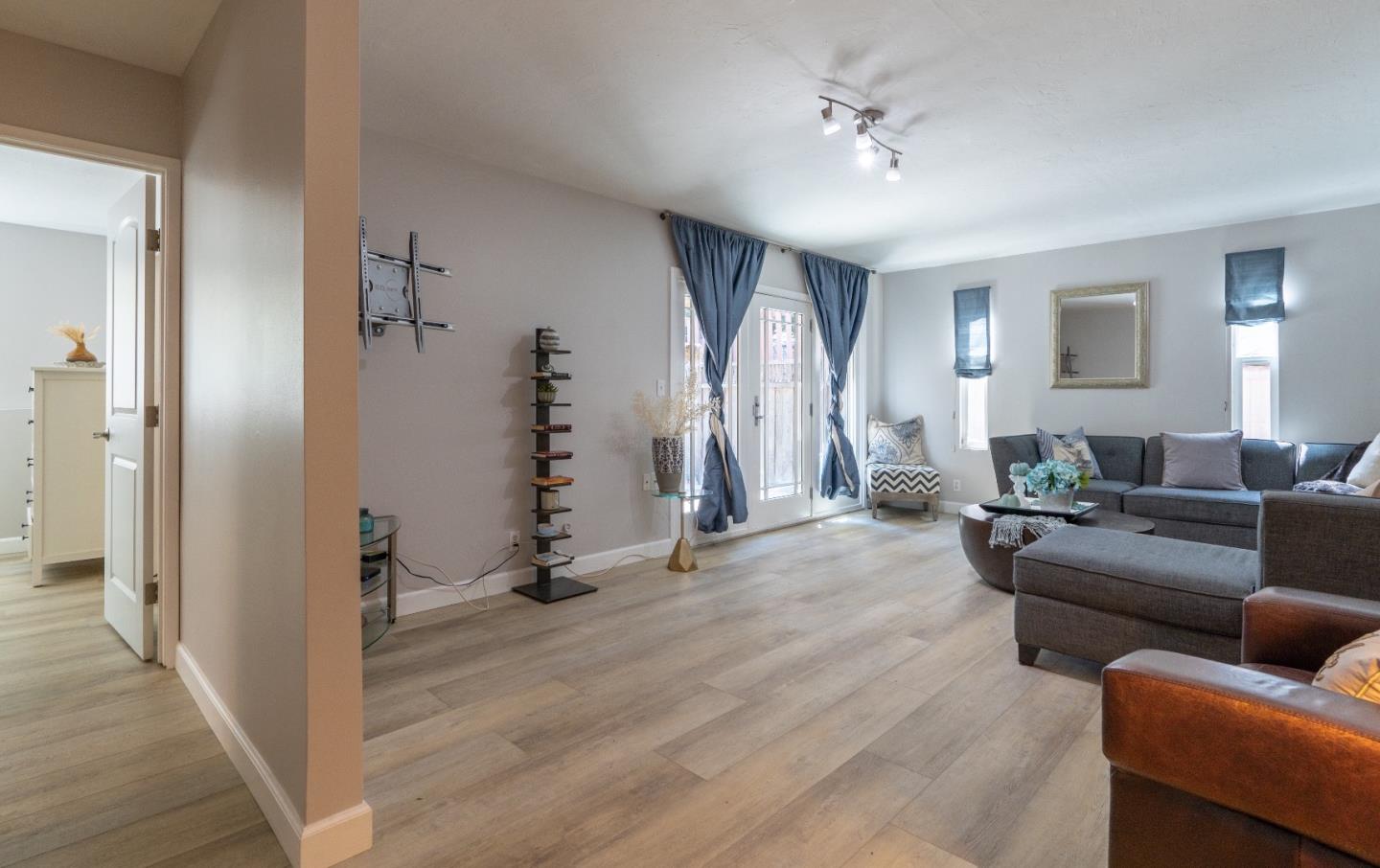 815 Cape Breton Drive Pacifica, CA 94044 - Photo 39 of 65 a view of a livingroom with furniture and staircase