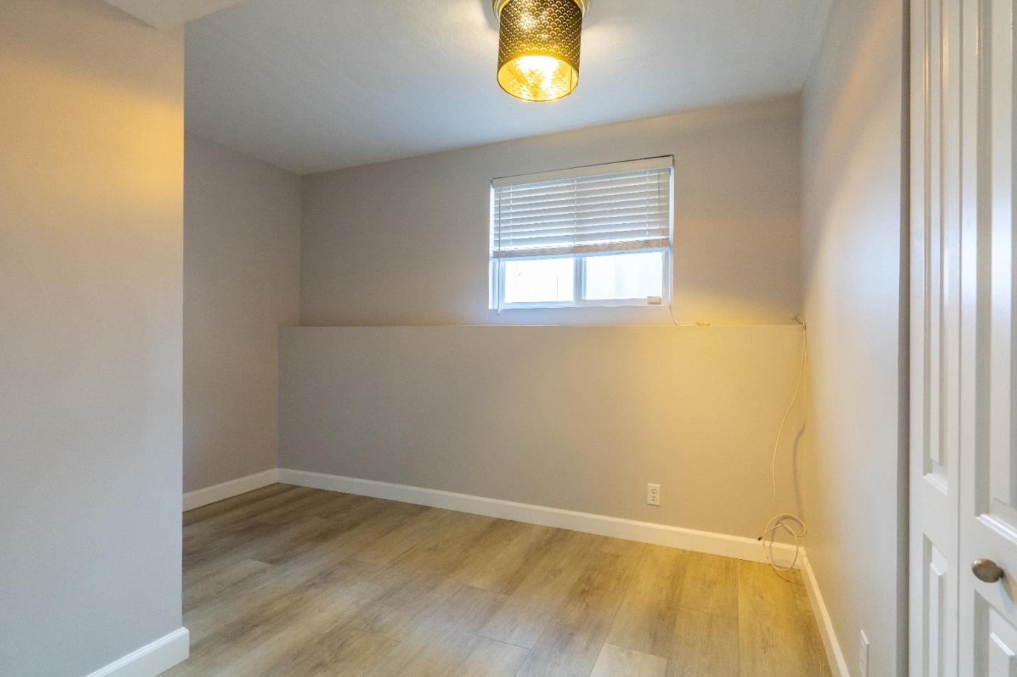 815 Cape Breton Drive Pacifica, CA 94044 - Photo 43 of 65 an empty room with a window and mirror