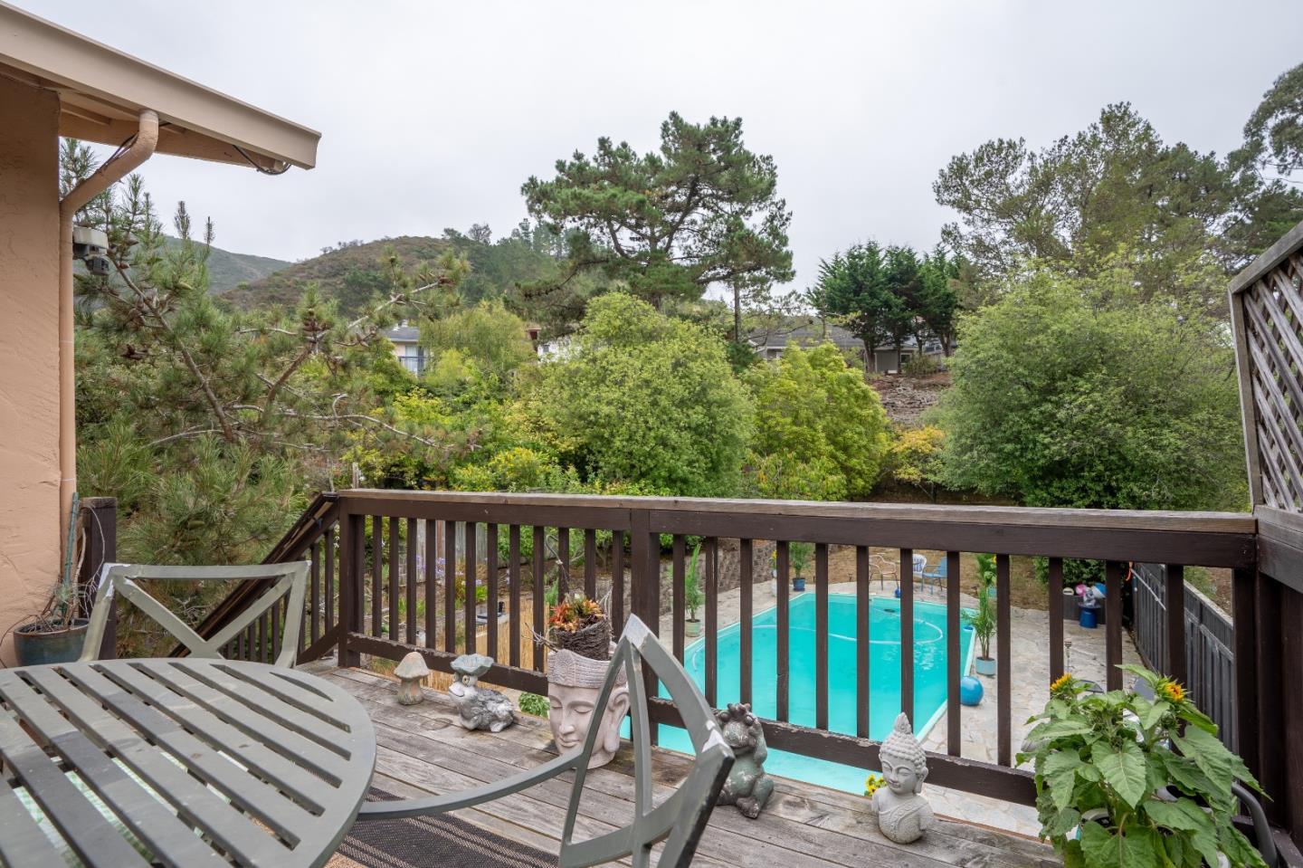 815 Cape Breton Drive Pacifica, CA 94044 - Photo 49 of 65 a view of a balcony with wooden floor and outdoor seating