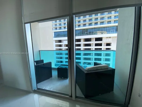 a view of a room with windows