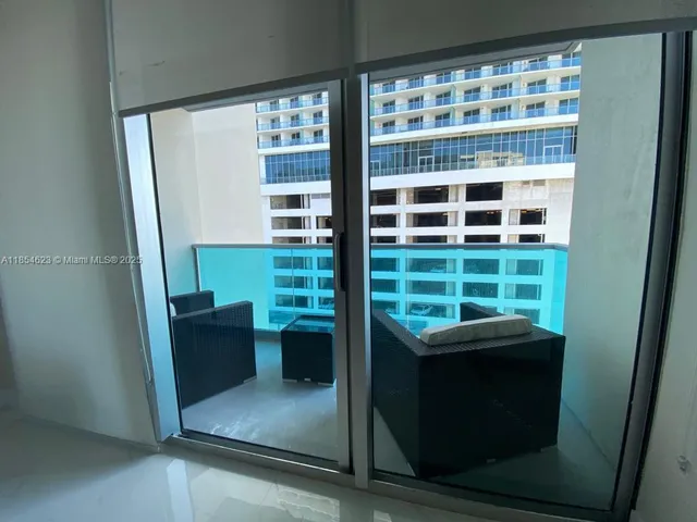 a view of a room with windows