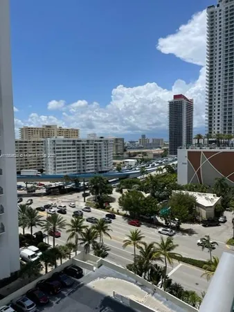 a view of a city with tall buildings